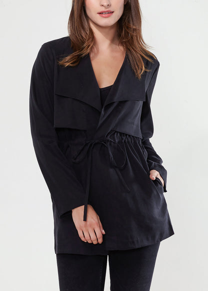 Black Ro&amp;de Noir open front jacket by Lemon Hera, shown on a model, featuring a sleek, stylish design perfect for layered outfits.