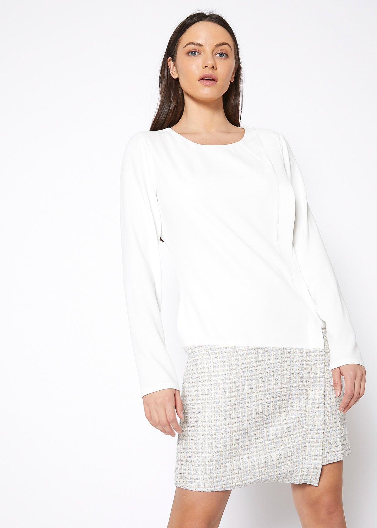 Ivory tweed hem faux wrap dress by Lemon Hera, showcasing the elegant dress with a wrap-style design and textured fabric.