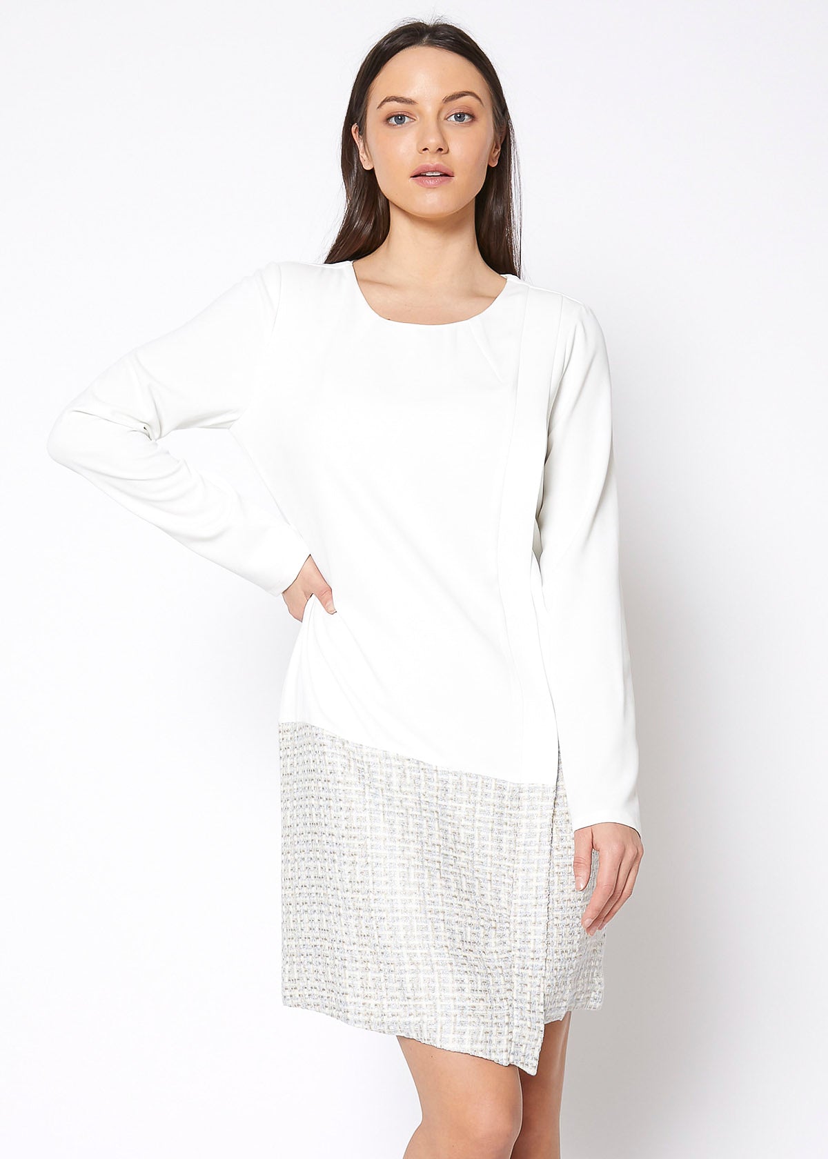 Ivory tweed hem faux wrap dress by Lemon Hera, featuring a stylish wrap design and textured fabric for a sophisticated look.