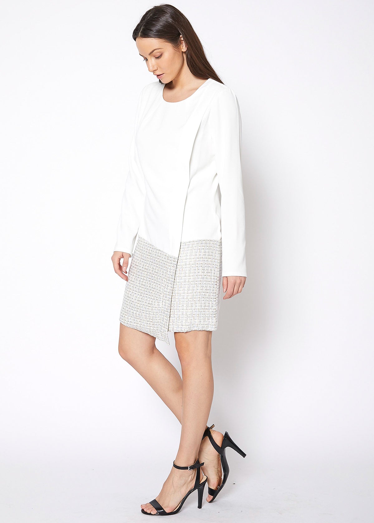 Ivory tweed hem faux wrap dress by Lemon Hera, showing the stylish dress with a wrap design and textured tweed hem.
