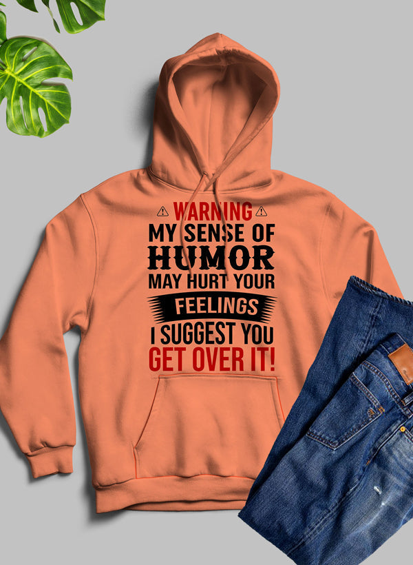 Black hoodie by Jade Thalassa with bold warning text, "My Sense Of Humor May Hurt Your Feelings," displayed on the front.