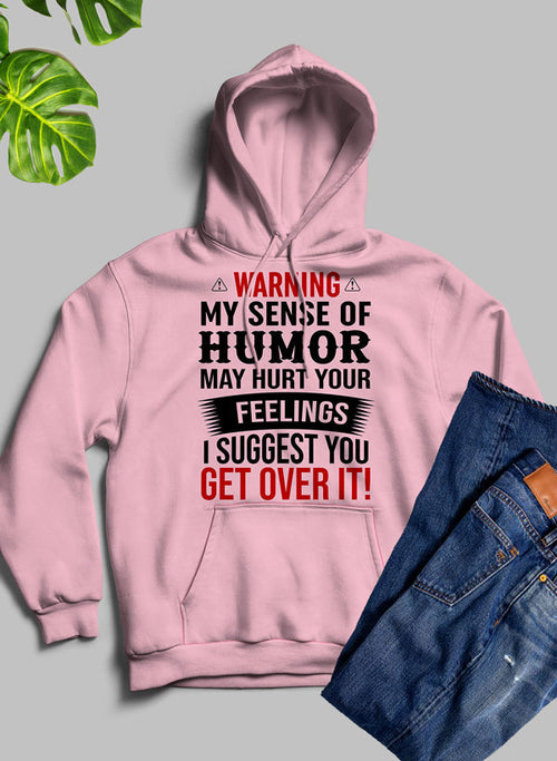 Black hoodie from Jade Thalassa with humorous warning message: "Warning My Sense Of Humor May Hurt Your Feelings" printed on the front.