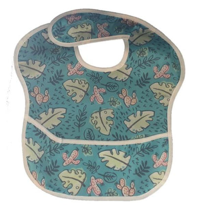 Waterproof baby bib with crumb catcher in blue cactus and leaf design, by Raspberry Pallas, made of durable jeans material.