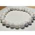 8mm white howlite beaded elastic stretch bracelet by Silver Hestia, showcasing smooth white gemstone beads on a flexible elastic band.