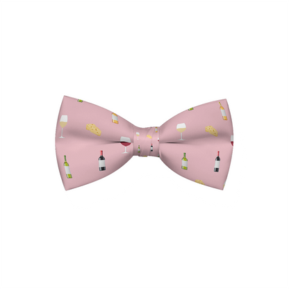 Pink dog bow tie with wine and cheese pattern from Plum Semele, perfect for stylish pet accessories and special occasions.