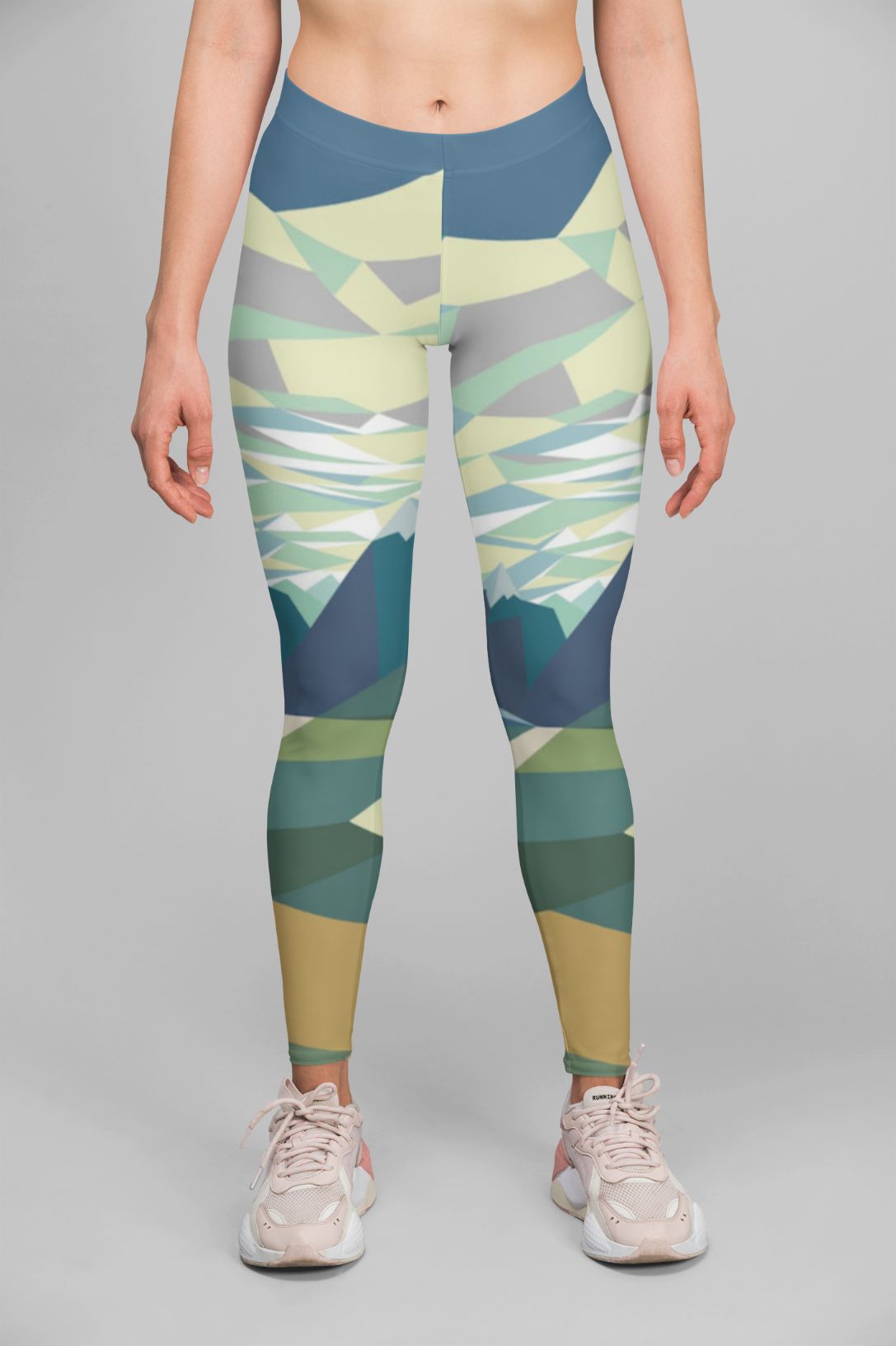 Sky Felix Alpine Scenry leggings featuring a scenic mountain print, shown on a model with a fitted style and vibrant colors.