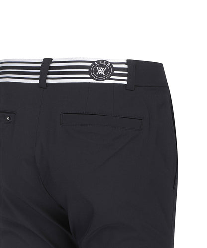 Black ANEW Golf women’s banding point boostcut long pants by Amethyst Lucy, designed for comfort and style in active wear.