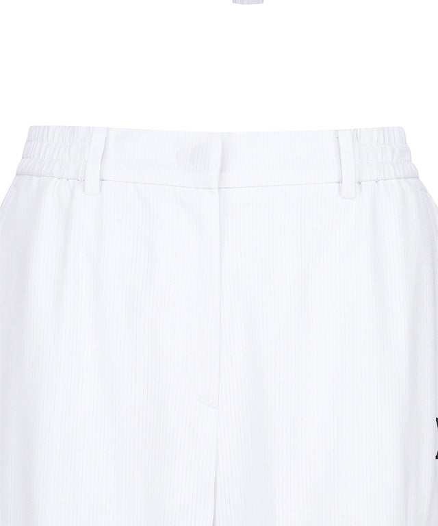White women’s deformation mesh jogger long pants by Amethyst Lucy, designed for active wear and comfort.