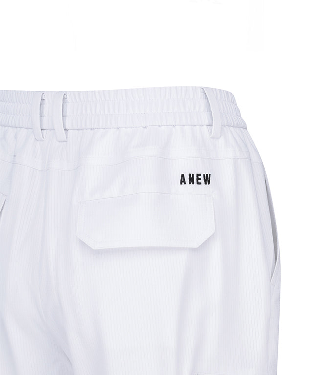 Women’s white deformation mesh jogger pants by Amethyst Lucy, featuring a comfortable long athletic fit and stylish design.