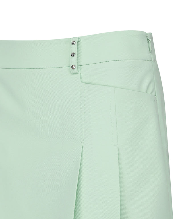 Light green women’s golf skirt with half pleats and under line point design by Amethyst Lucy, showcasing its stylish and comfortable fit.
