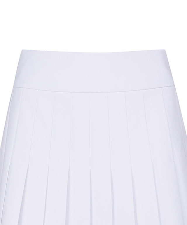 Women’s white pleated skirt with logo band from Start2Finish, shown on a model with a casual, stylish look.