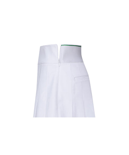 Women’s white pleated skirt with logo band detail by Start2Finish, shown on a model.