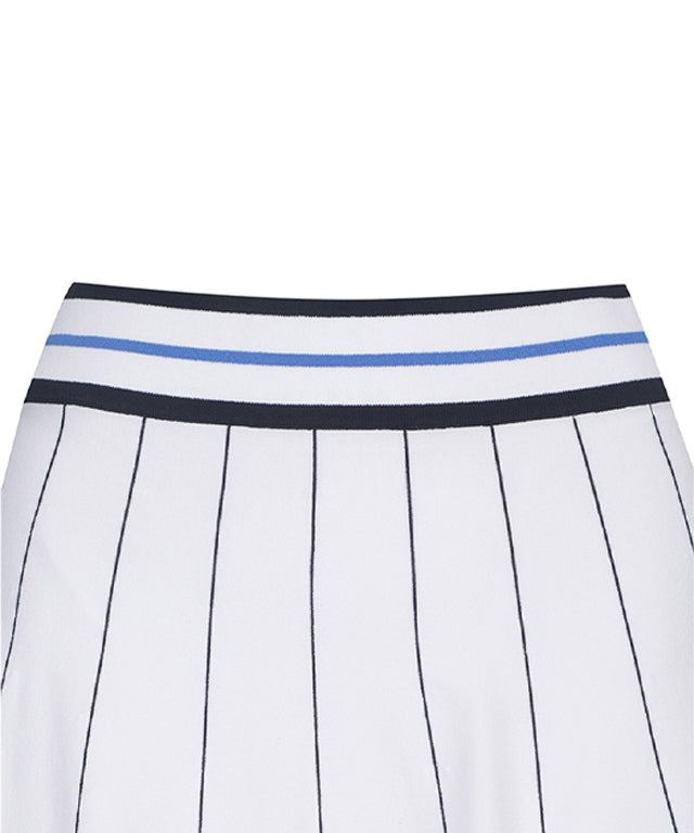 White women’s preppy golf skirt by Amethyst Lucy, styled for a classic, sporty look in a clean, tailored design.