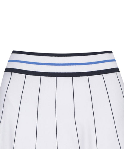 White women’s preppy golf skirt by Amethyst Lucy, styled for a classic, sporty look in a clean, tailored design.