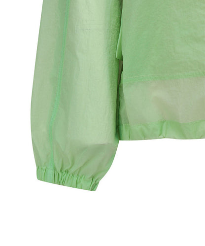 Light green women’s Stingray fit jacket with shirring details by Amethyst Lucy, styled as a golf accessories piece.