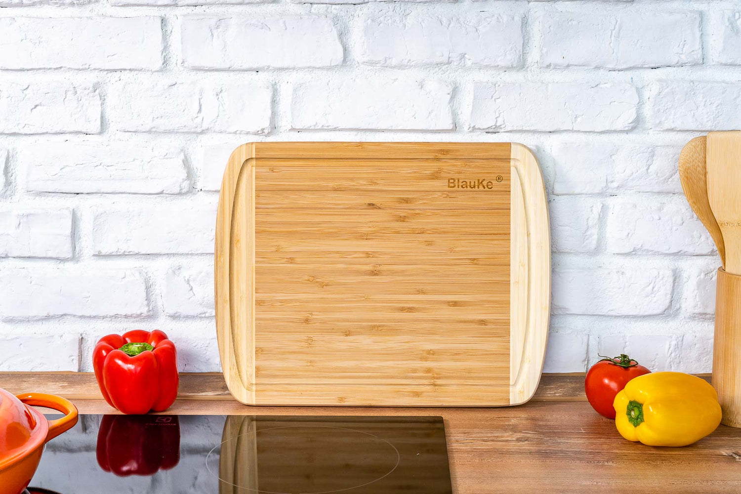 Large bamboo kitchen cutting board by Jade Danae, 14x11 inches, ideal for chopping and food prep in the kitchen.