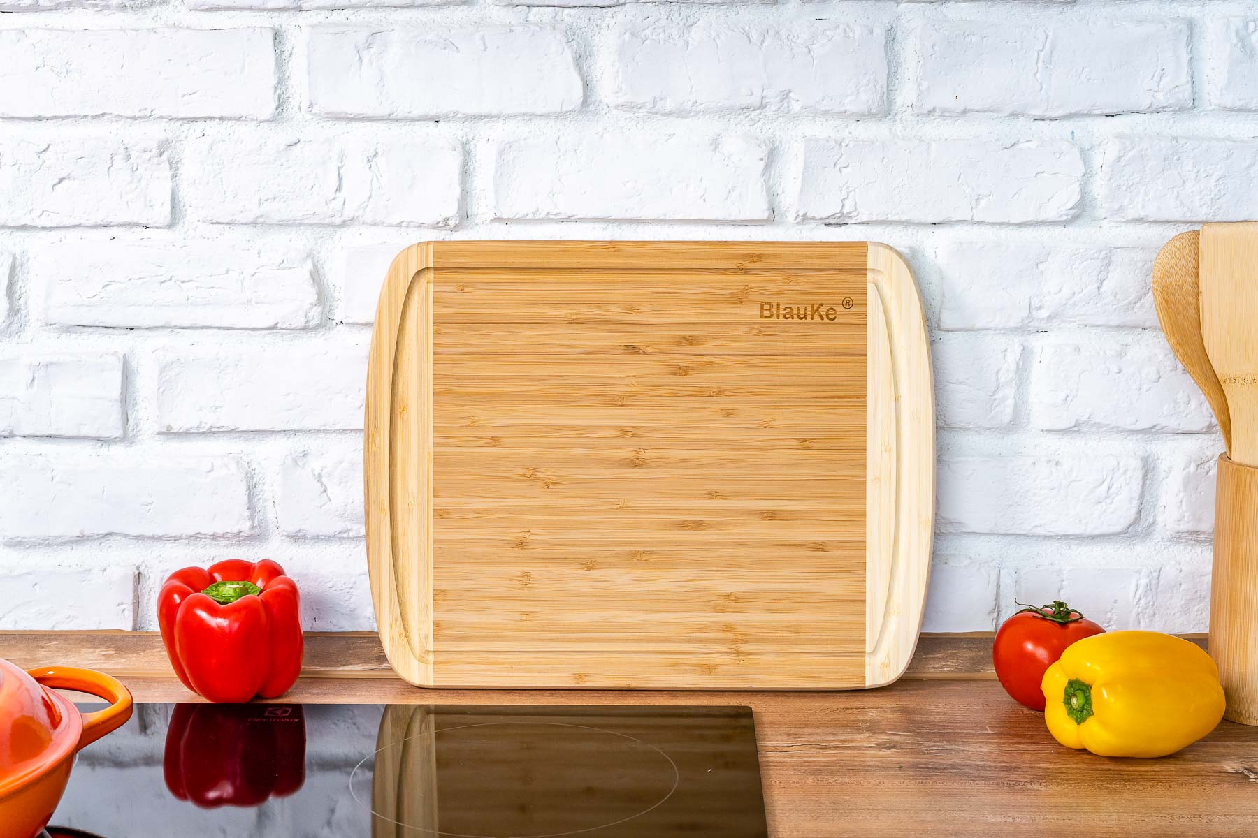 Large bamboo kitchen cutting board by Jade Danae, 14x11 inches, ideal for chopping and food prep in the kitchen.