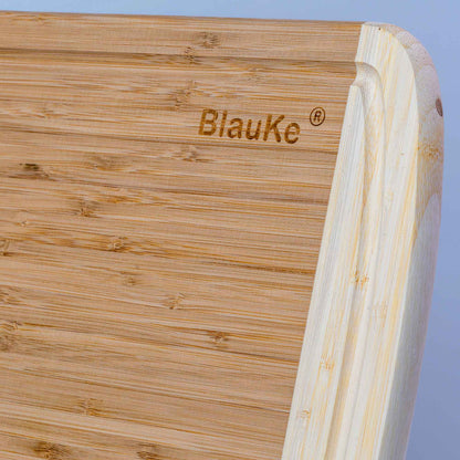 Large bamboo kitchen cutting board from Jade Danae, 14x11 inches, ideal for chopping and food prep with a natural wood finish.