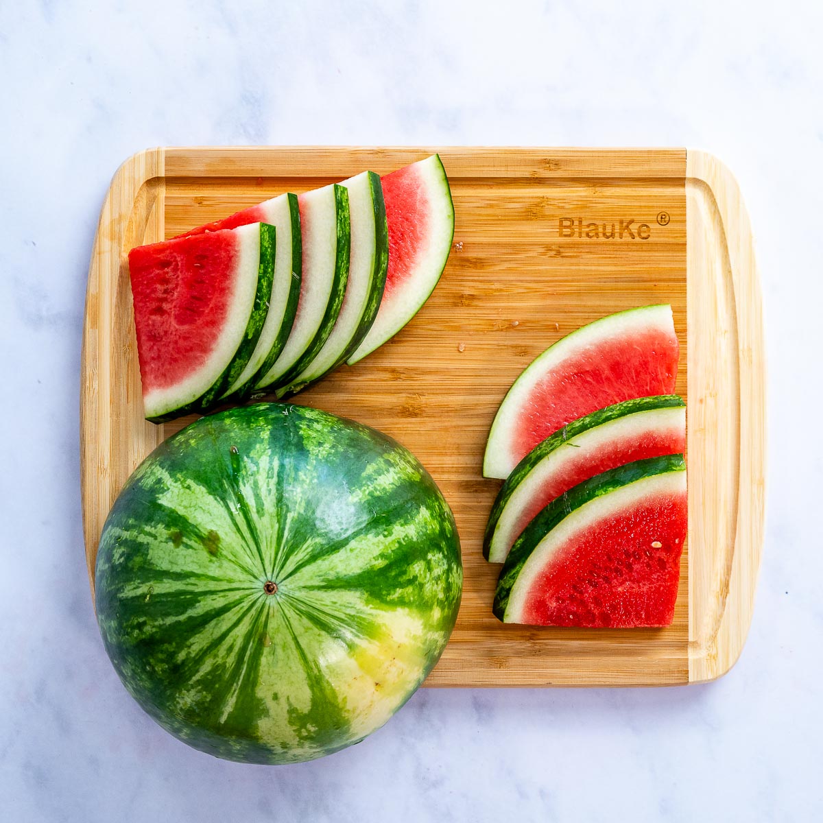 Large bamboo kitchen cutting board by Jade Danae, 14x11 inches, ideal for chopping and food prep.