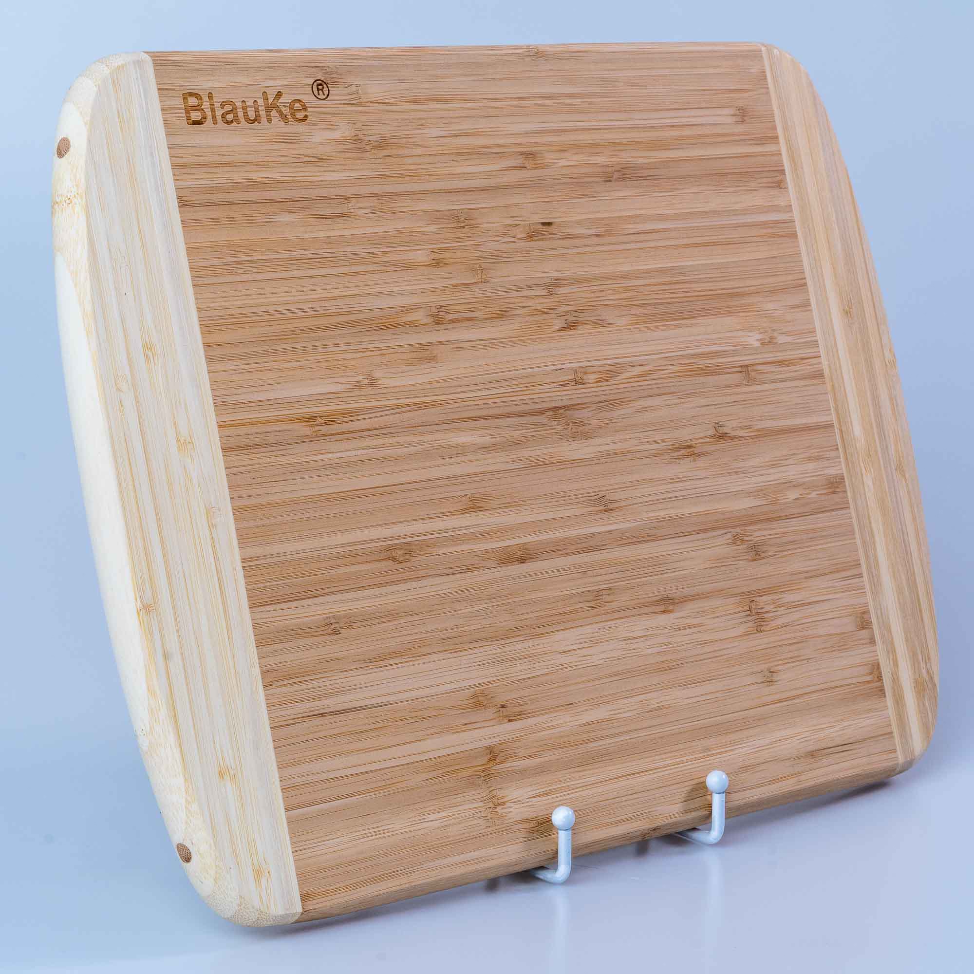 Large bamboo kitchen cutting board by Jade Danae, 14x11 inches, sturdy wooden chopping board for food preparation.