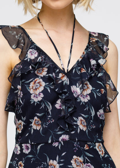 Navy wax flower mini ruffled sleeveless dress by Lemon Hera, showing a stylish sleeveless dress with ruffle details.