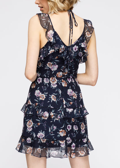 Navy Wax Flower Mini Ruffled Sleeveless Dress by Lemon Hera, showing the dress&