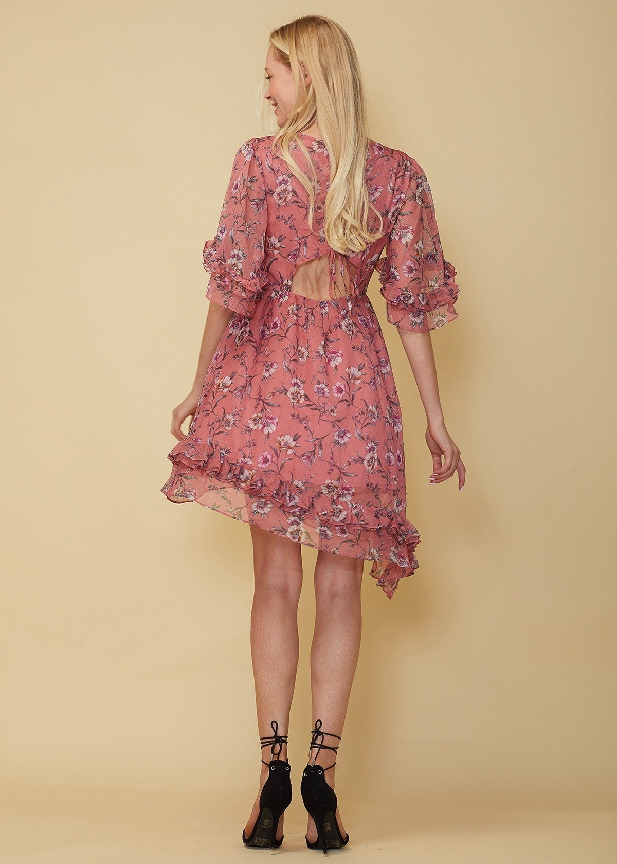 Lemon Hera wax flower asymmetrical hi-lo dress in vibrant fabric, featuring a flowing silhouette and unique hemline.