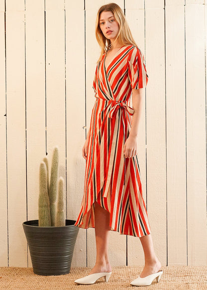 Lemon Hera puff sleeve wrap dress in Poppy Multi with floral pattern, featuring a fitted waist and flowing skirt.