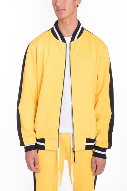 Yellow Lime Milo Rally Track Jacket for activewear, shown on a hanger with front view and sporty design details.