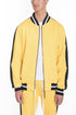 Lime Milo heavy weight solid track jacket for activewear, shown in yellow color with front zipper and sporty design.