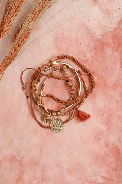 Stackable bracelet with tiger eye beads from Periwinkle Aether, featuring smooth, rounded tiger eye gemstones for stylish accessories.