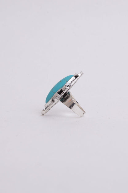 Silver ring featuring a turquoise marquise cut gemstone, stylish accessories piece by Periwinkle Aether.