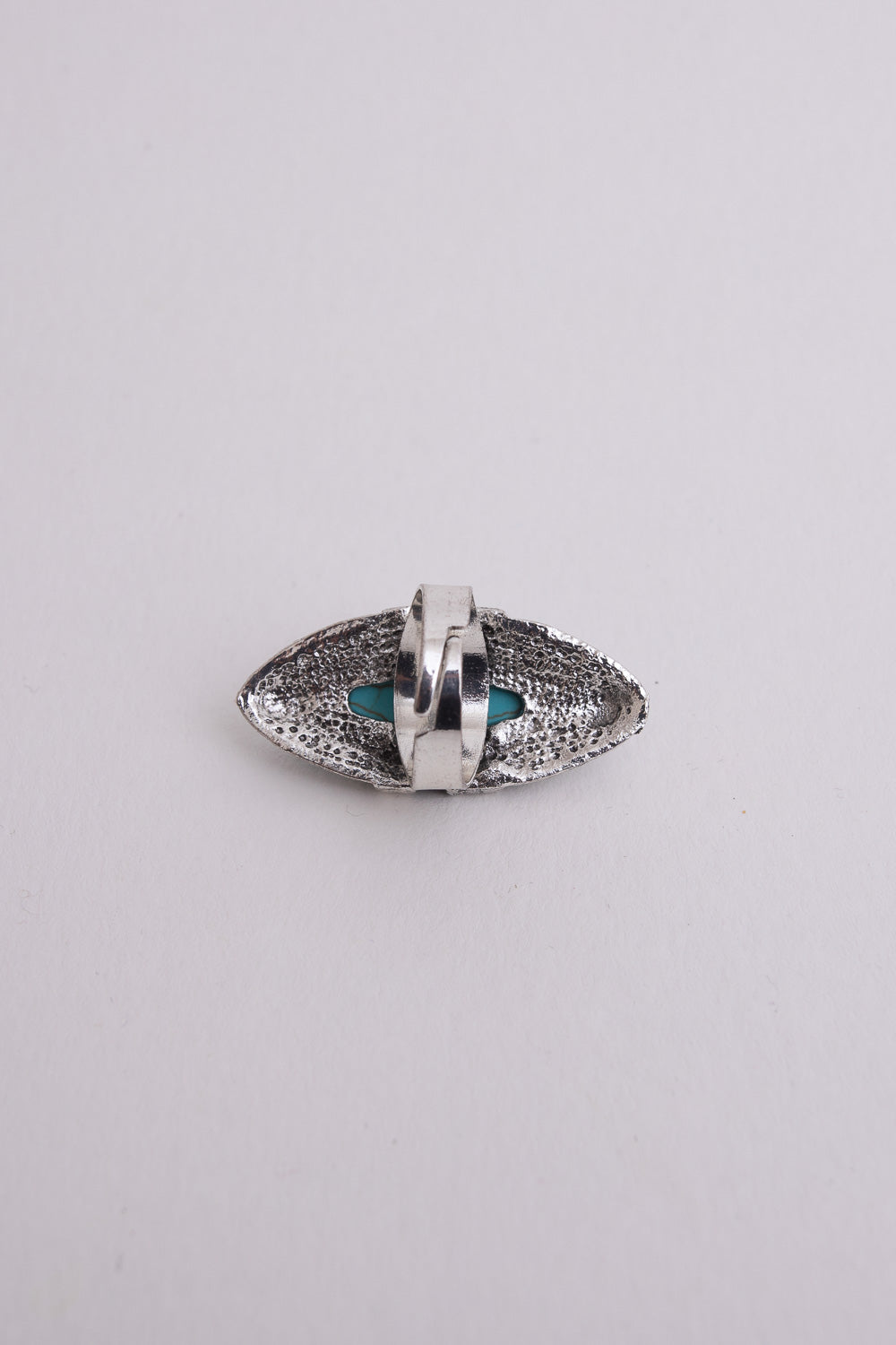 Turquoise marquise cut silver ring from Periwinkle Aether, showcasing a sleek band with a vibrant turquoise gemstone.