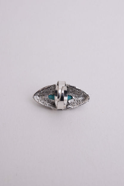 Turquoise marquise cut silver ring from Periwinkle Aether, showcasing a sleek band with a vibrant turquoise gemstone.