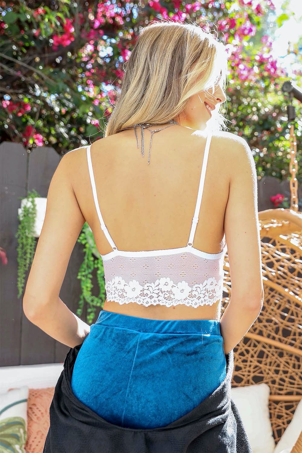 Sky blue floral lace strappy front bralette by Periwinkle Aether, featuring delicate lace and adjustable straps.
