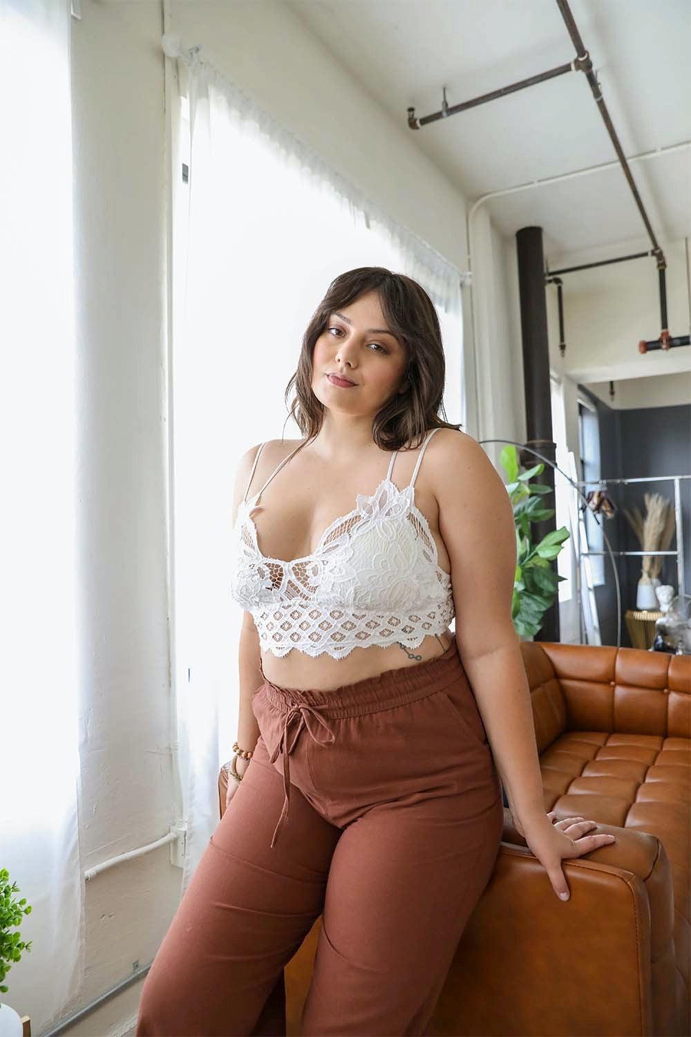 White plus crochet lace longline bralette from Periwinkle Aether, featuring intricate lace details and a comfortable fit.