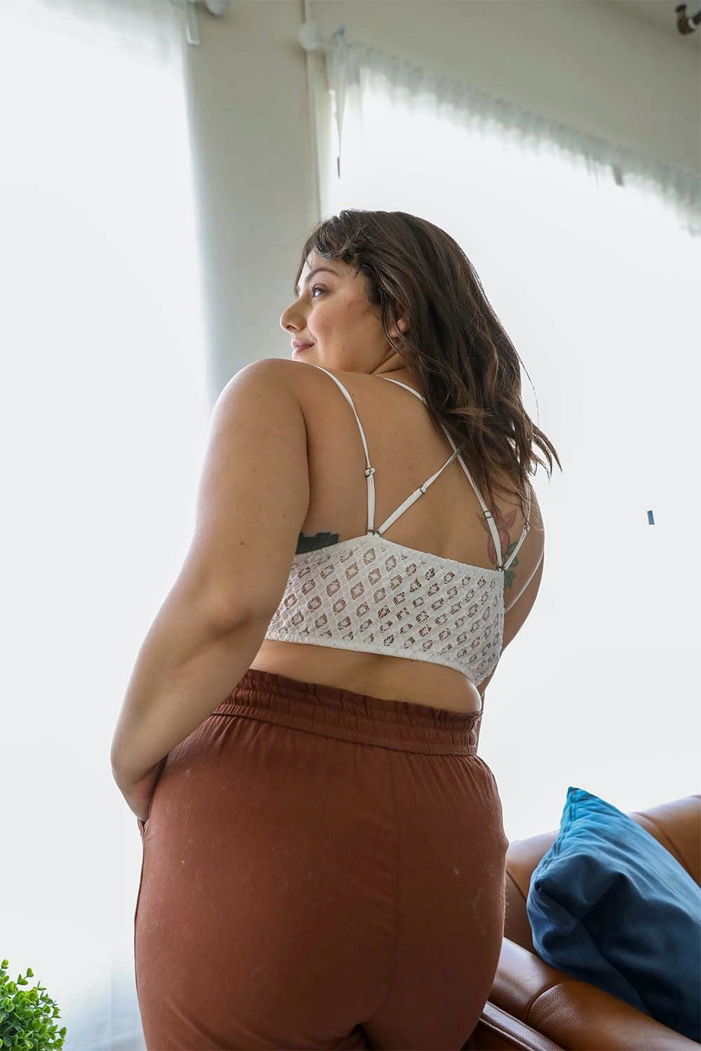 White plus crochet lace longline bralette from Periwinkle Aether, showing intricate lace details and back view.