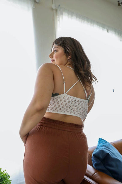 White plus crochet lace longline bralette from Periwinkle Aether, showing intricate lace details and back view.