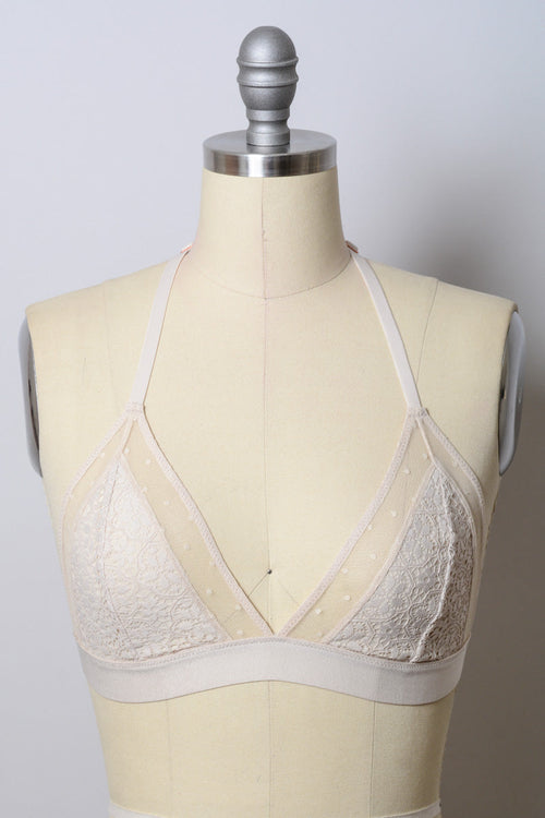Natural crochet T-back bralette from Periwinkle Aether, showcasing intricate lace detail and comfortable lingerie design.