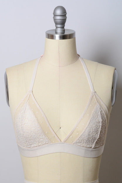 Natural crochet T-back bralette from Periwinkle Aether, showcasing intricate lace detail and comfortable lingerie design.
