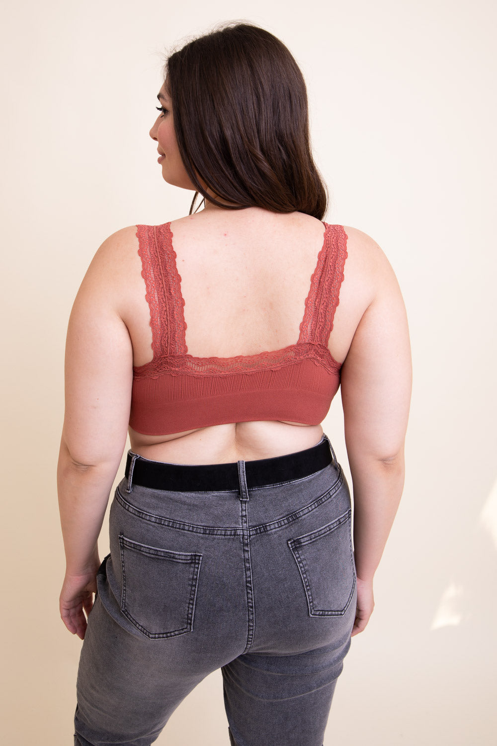 Lace trim padded bralette from Periwinkle Aether with delicate lace detailing, designed for comfortable wear and stylish support.