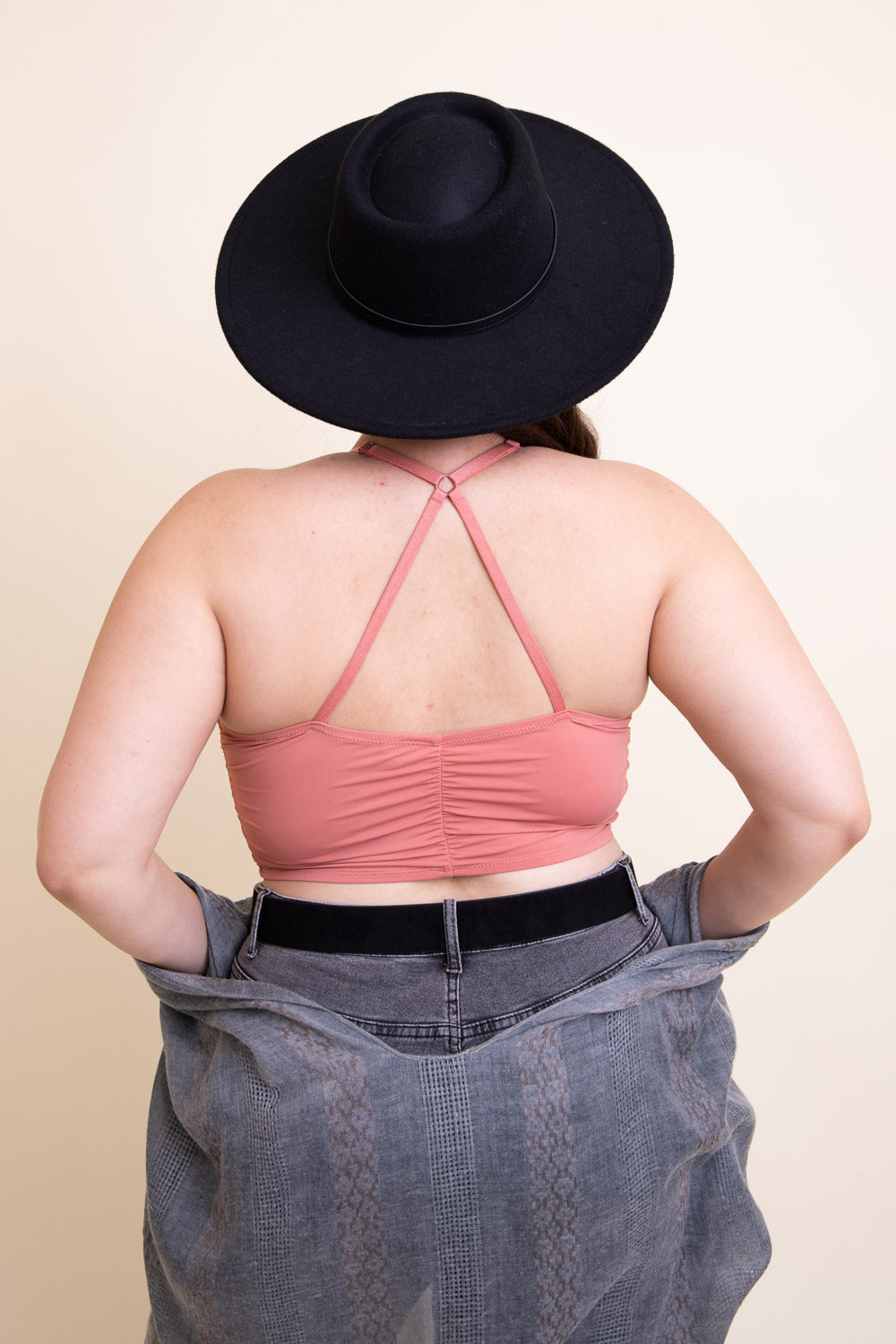 Pink ruched plus-size bralette tank top by Periwinkle Aether with soft fabric and adjustable straps.