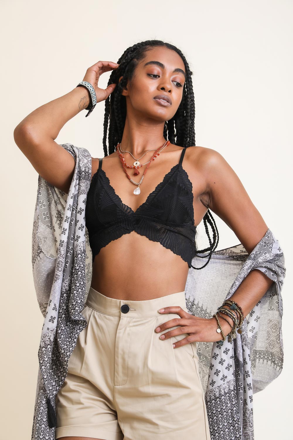 Black lace butterfly bralette from Periwinkle Aether, featuring delicate floral lace and adjustable straps for a comfortable fit.