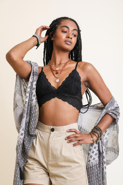 Black lace butterfly bralette from Periwinkle Aether, featuring delicate floral lace and adjustable straps for a comfortable fit.