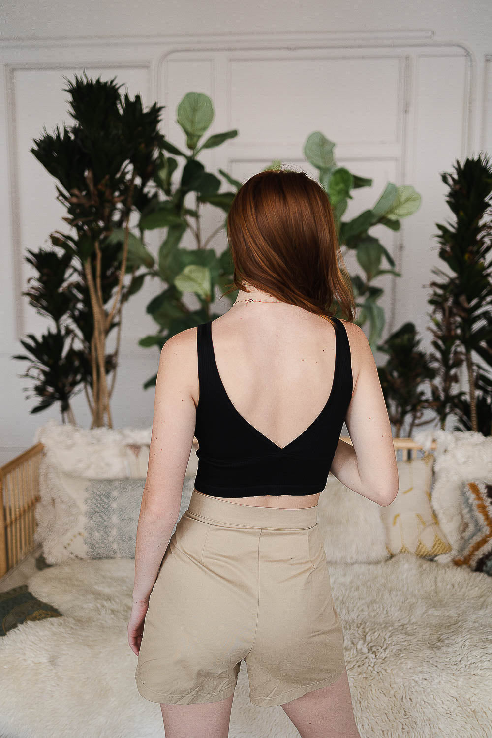 Reversible black plunge seamless longline brami from Periwinkle Aether, designed for comfortable lingerie and versatile wear.