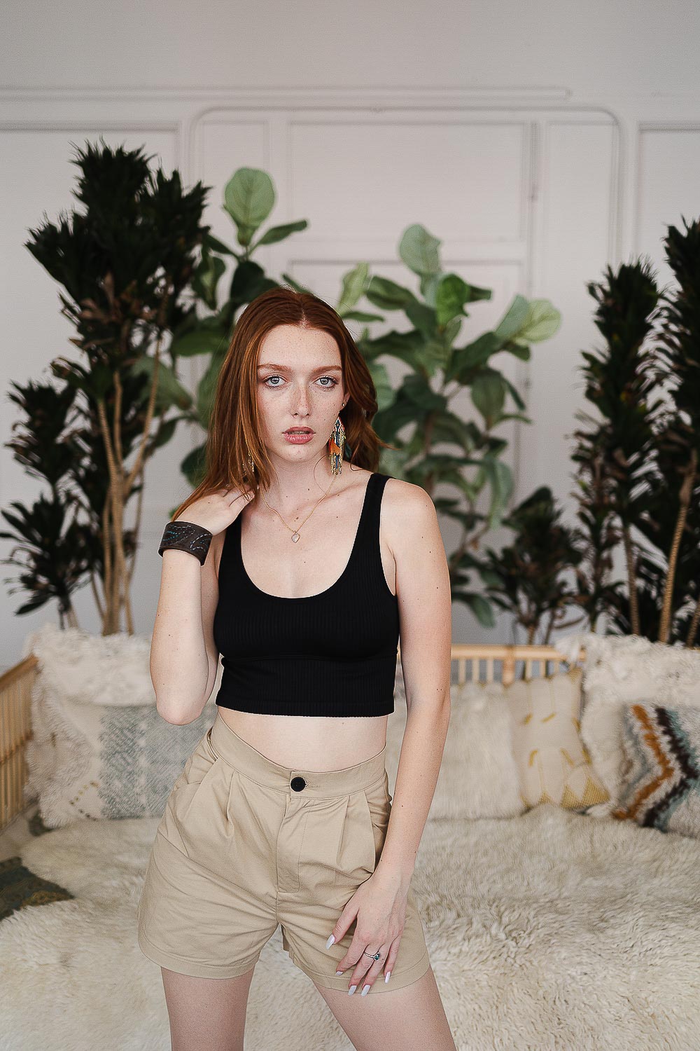 Black reversible plunge seamless longline brami by Periwinkle Aether, featuring a smooth, convertible lingerie design.