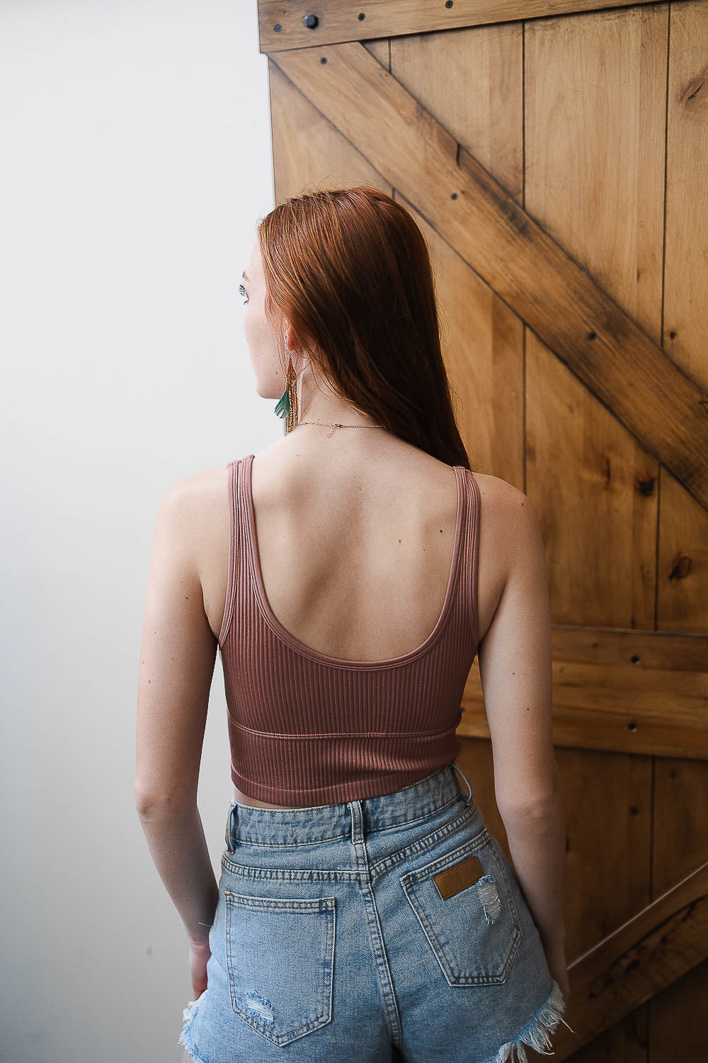 Reversible plunge seamless longline brami from Periwinkle Aether, soft pink and clay color, displaying its smooth, stretchy lingerie fabric.
