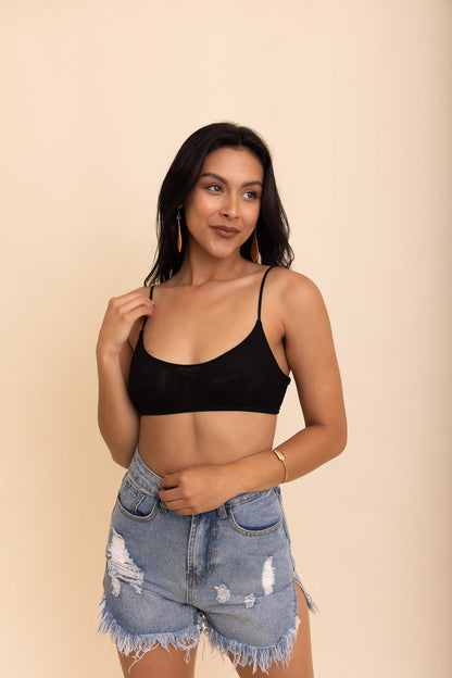 Black sheer mesh basic bralette by Periwinkle Aether, featuring lightweight, breathable fabric and delicate adjustable straps.