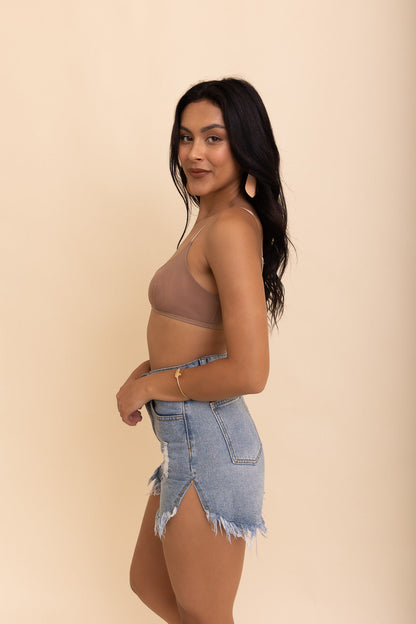 Nude sheer mesh basic bralette from Periwinkle Aether, featuring delicate fabric and simple, comfortable design.