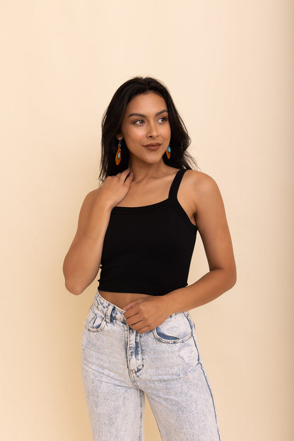 Black seamless brami top from Periwinkle Aether with a sleek, minimalist design, displayed on a plain background.